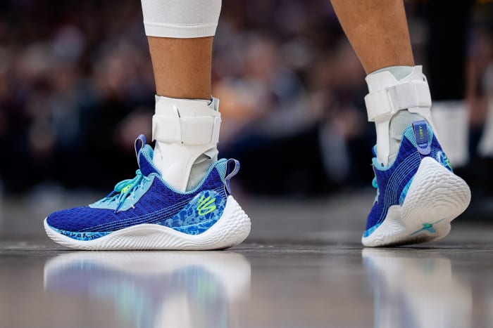 View of Stephen Curry's blue and white shoes.